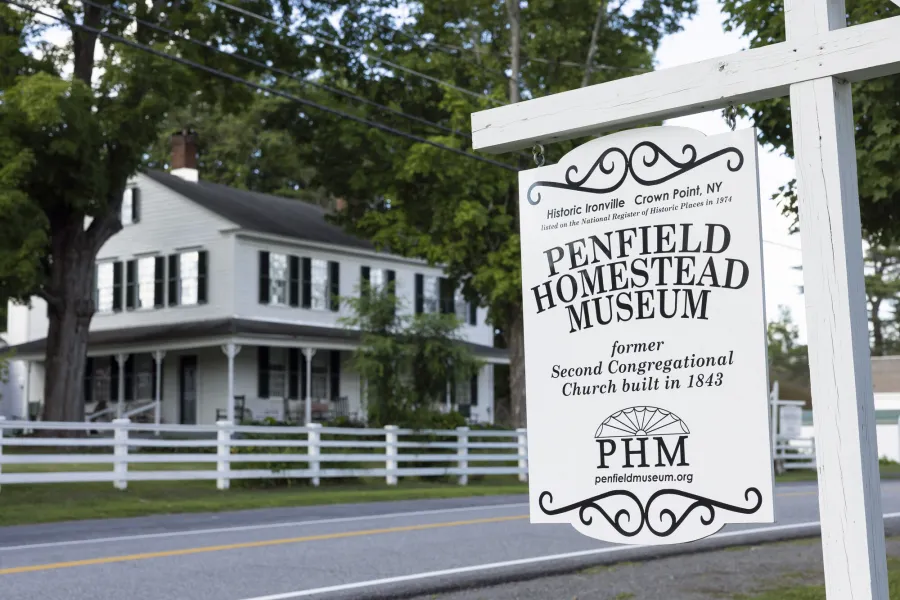 A sign for the Penfield Homestead Museum