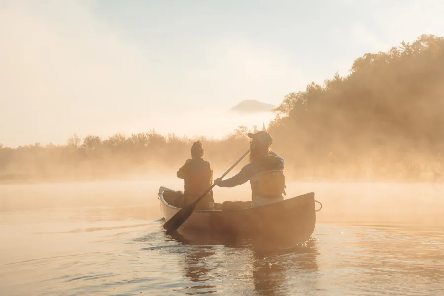 Two people on a misty morning paddle