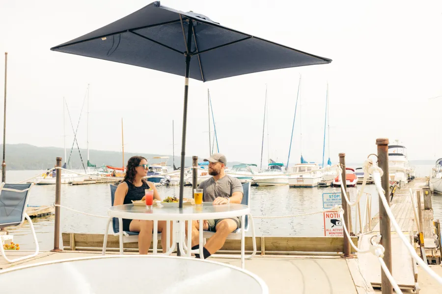 A couple dining on a dock 