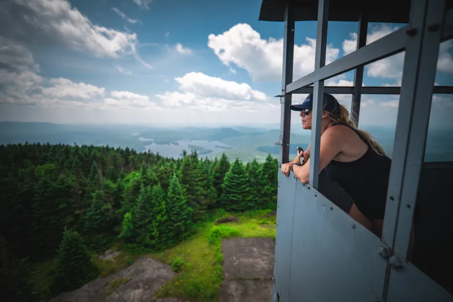 A woman in a firetower