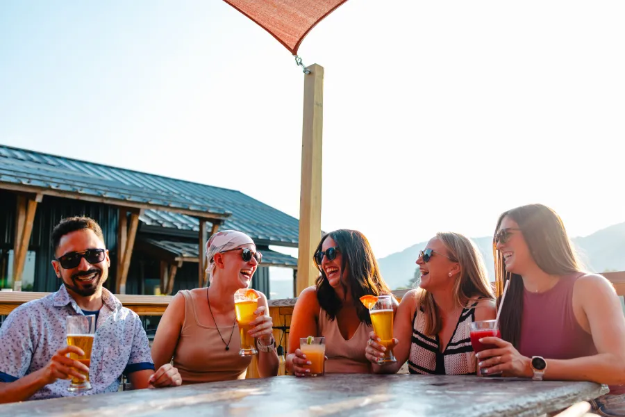 A friend group having a beer