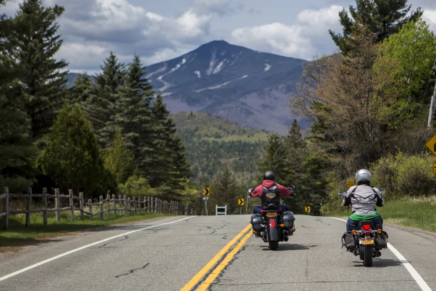 Motor bikes on the road in front of Whiteface Mountain