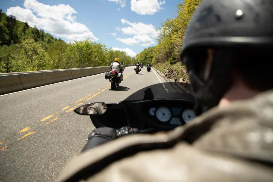 Motorcyclists on a mountain road