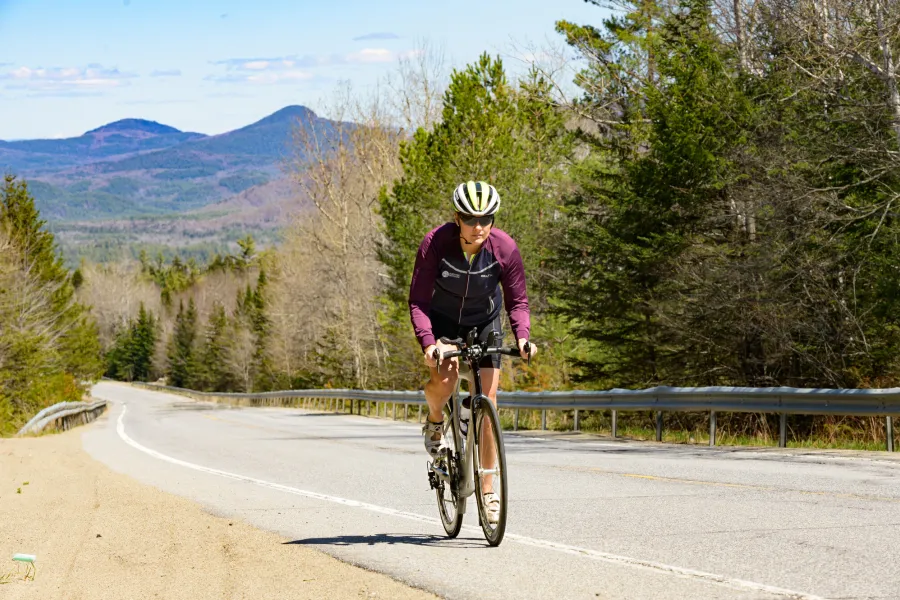 A road biker on a hilly route in the mountains