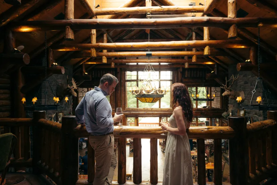 Two people drinking win at Whiteface Lodge