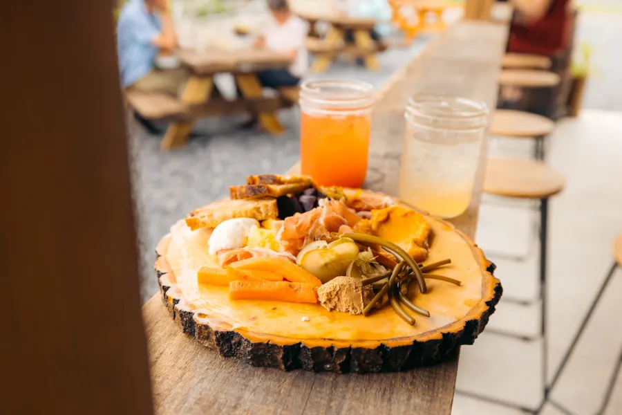 A plate of farm fresh food on a porch. 
