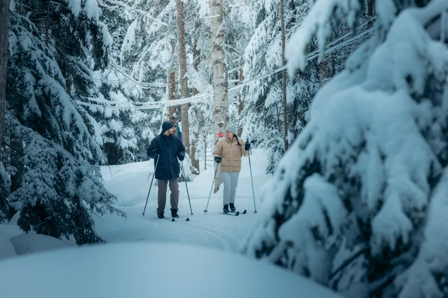A couple skiing at Dewey Mountain Ski Center.